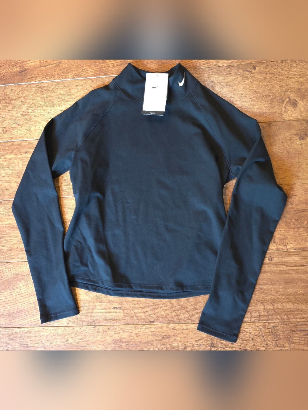 Nike Pro Women's Dri-FIT long-sleeve mock-neck top in black Size LRG.